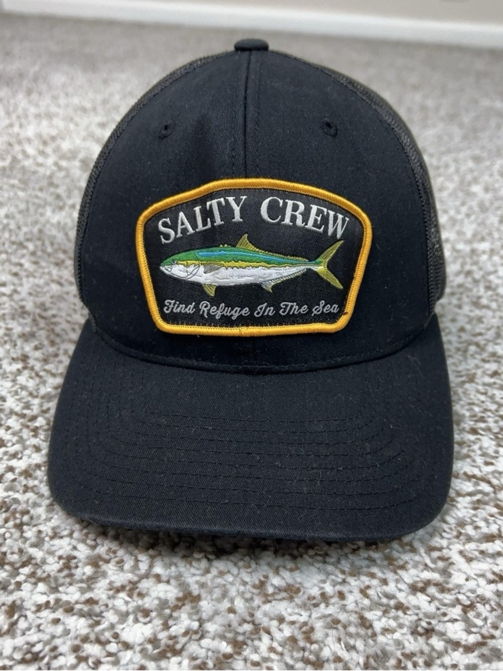 Salty Crew Black Trucker Hat with Yellow Outline and Fish Patch